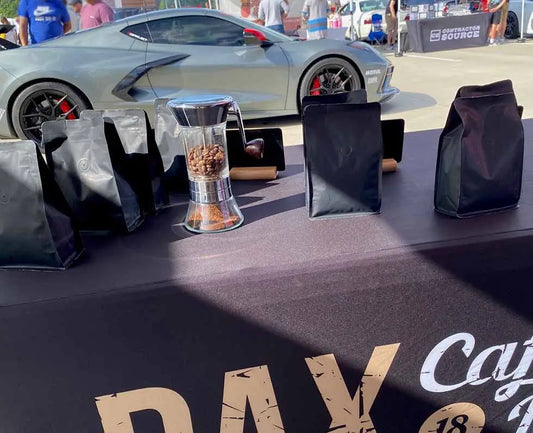 Specialty Coffee and Cars: Our Event Stand Featuring a Sport Car and Our Delicious Coffee