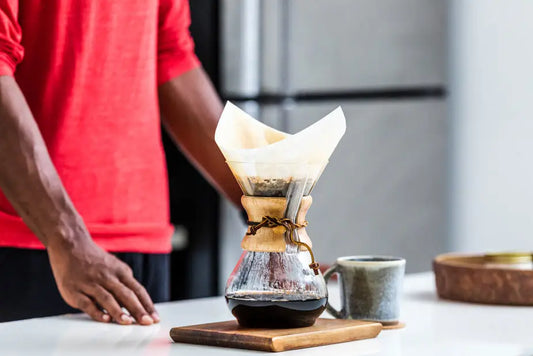 Man Awaits the Perfect Pour Over Coffee Brew – Exploring Drip, Organic, Brewing, and More